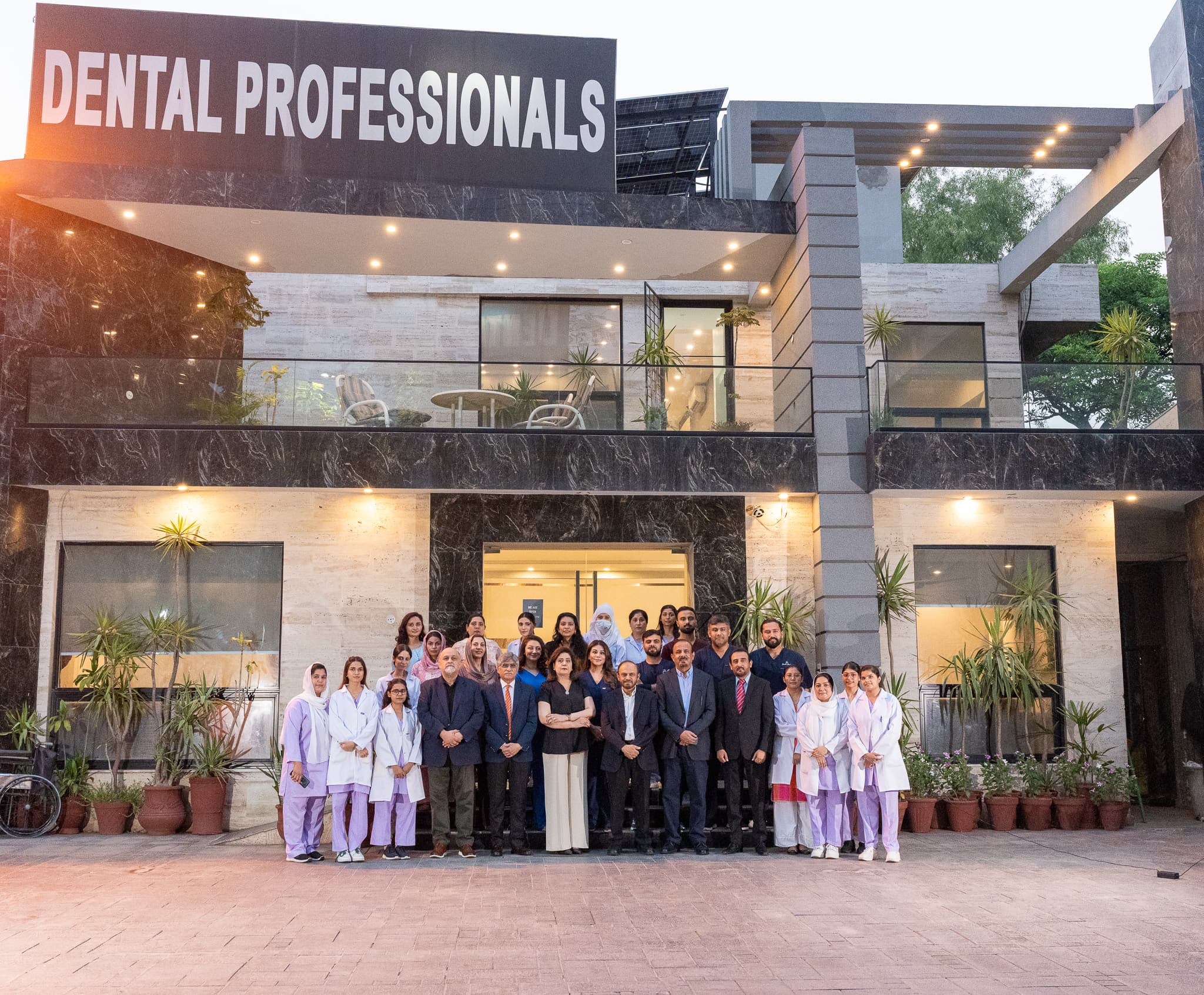Dental Professionals doctors and staff outside the clinic